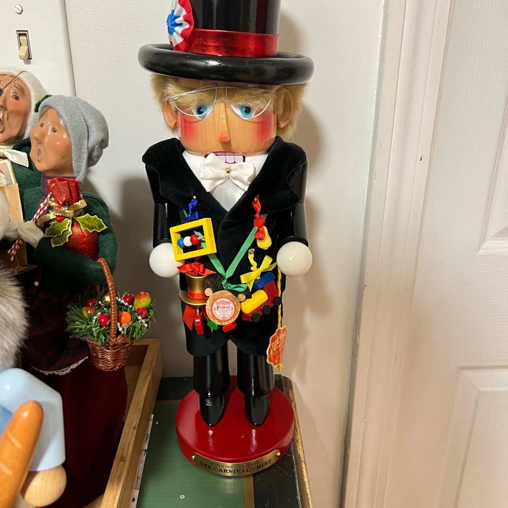 Festive Black Nutcracker with Red Accents